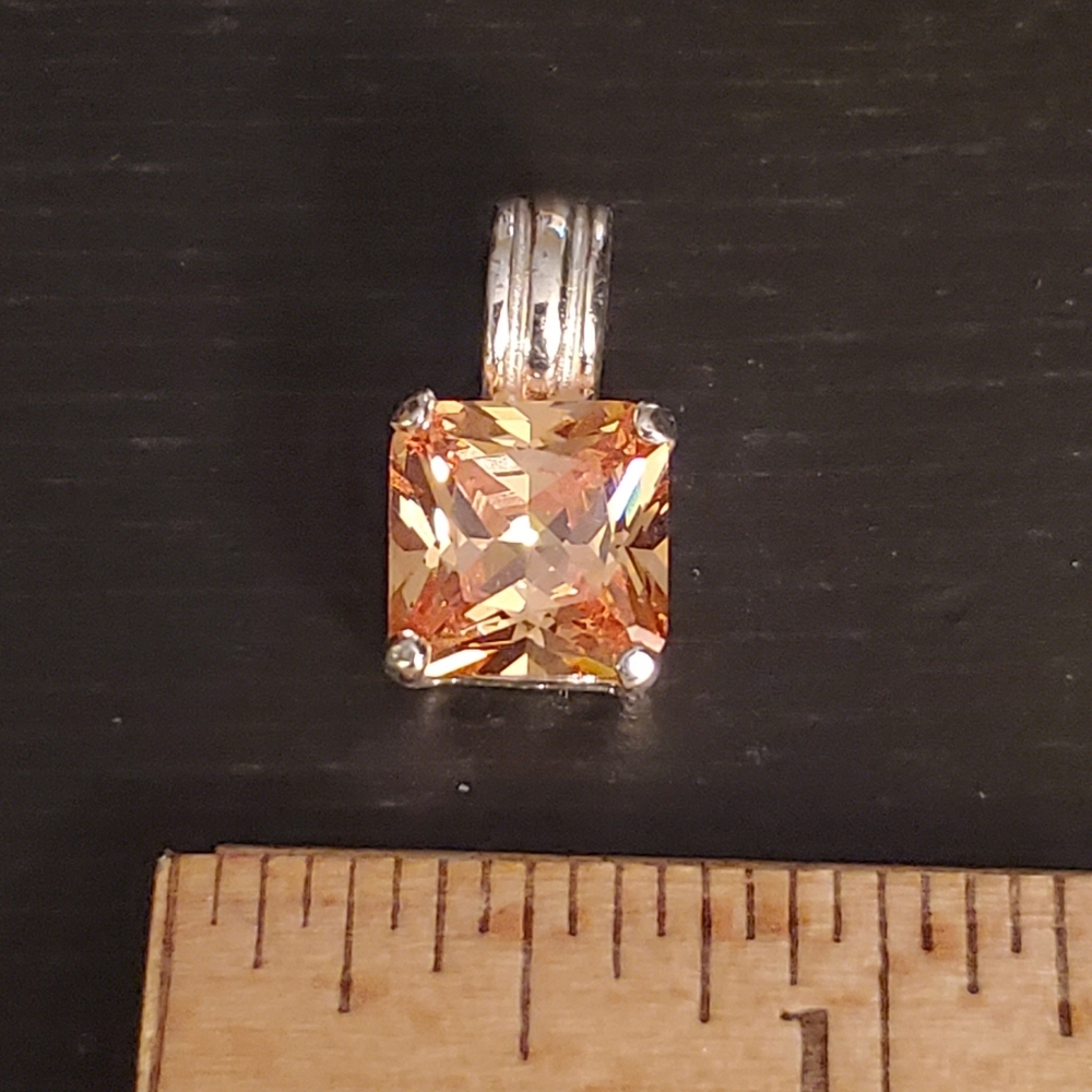 Silver and colored stone enhancer